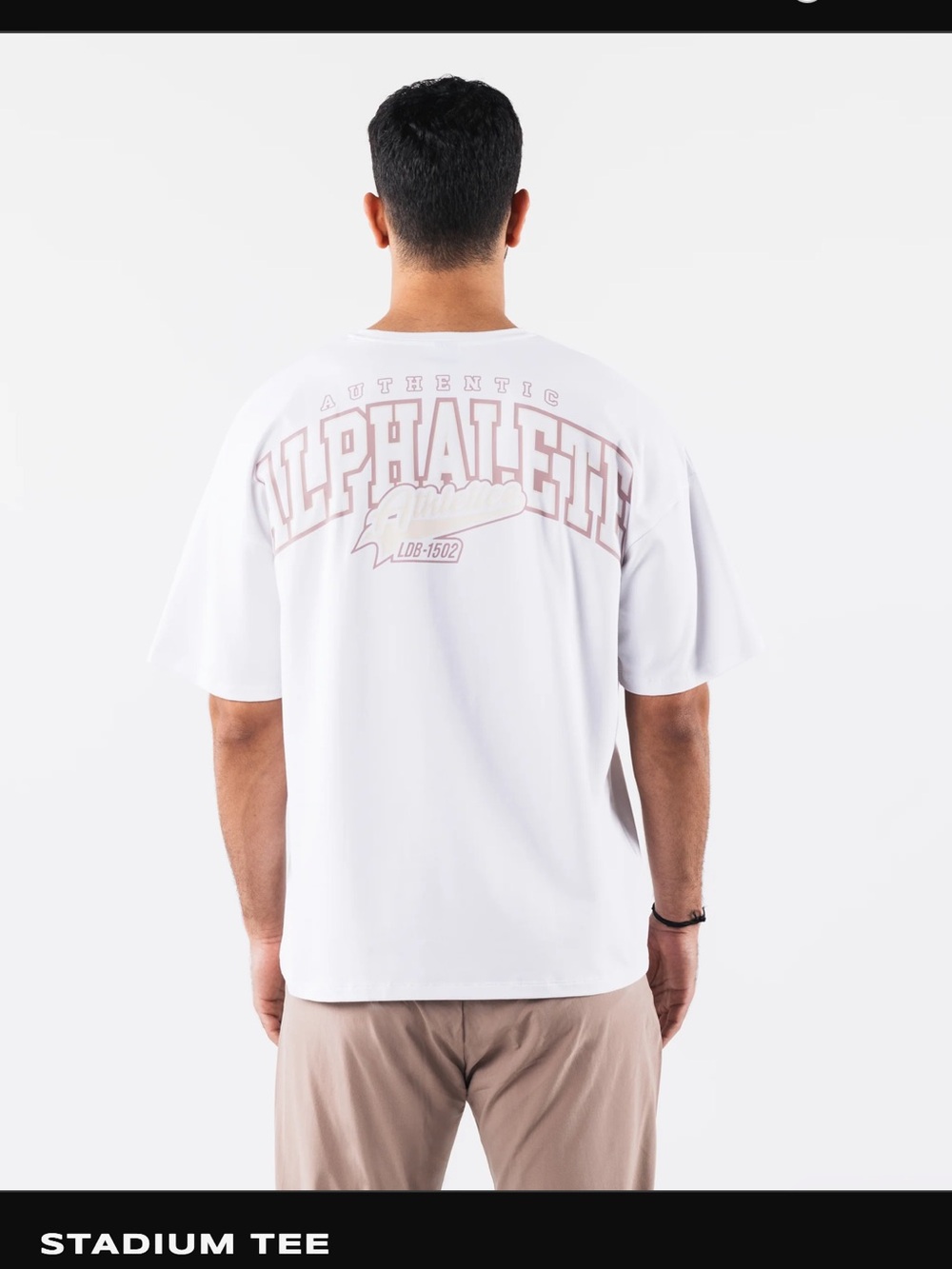 Alphalete White Tee with Faded Pink Back Logo